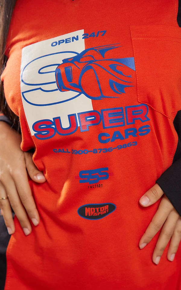 Petite Robe T-shirt Orange Imprimé Style Motocross 5 Petite Robe T-shirt Orange Imprimé Style Motocross – Image 3