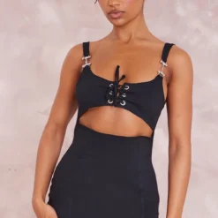 Robe Moulante Noire En Maille Stretch Tissée à Lacets Et Liserés